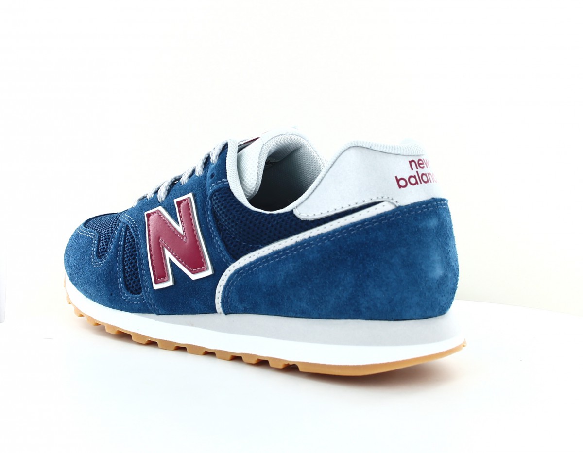 New Balance 373 suede bleu rouge gomme