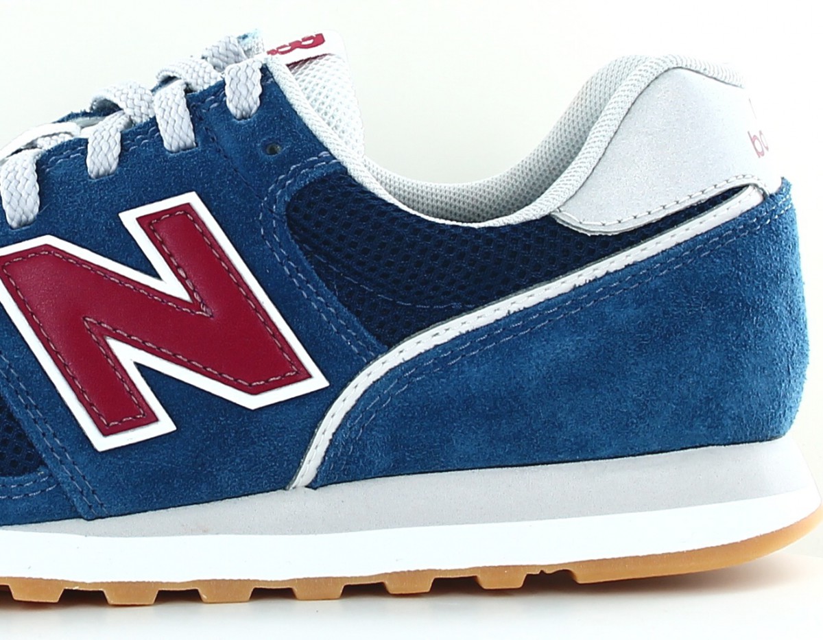 New Balance 373 suede bleu rouge gomme