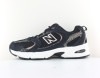New Balance 530 noir beige print
