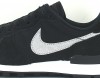 Nike Internationalist noir argent brillant blanc