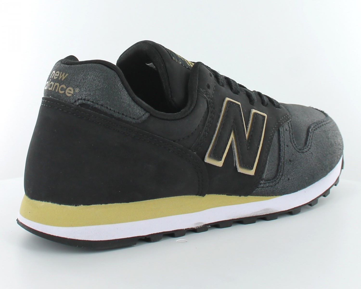 new balance noir et or femme