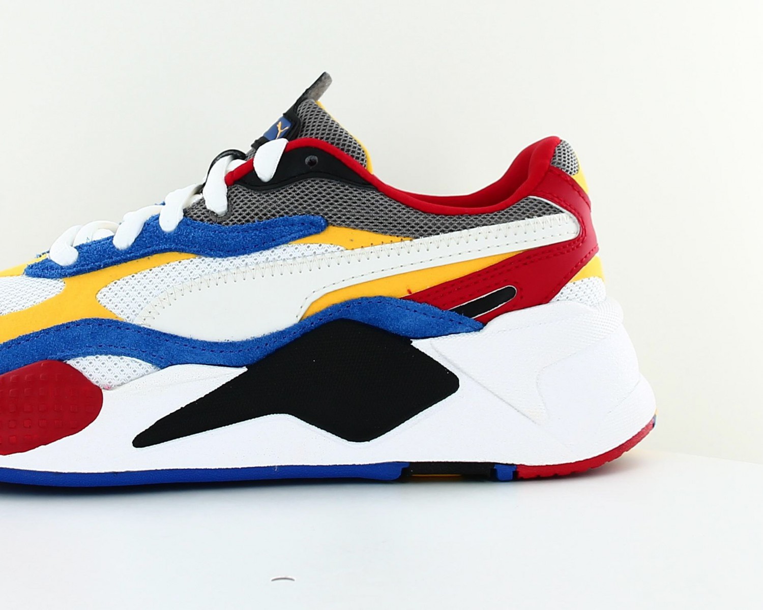 puma mostro jaune et bleu